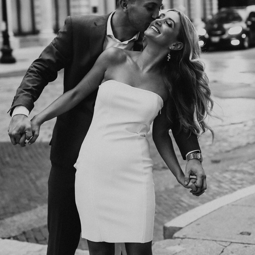 Strapless white dress with bow in back